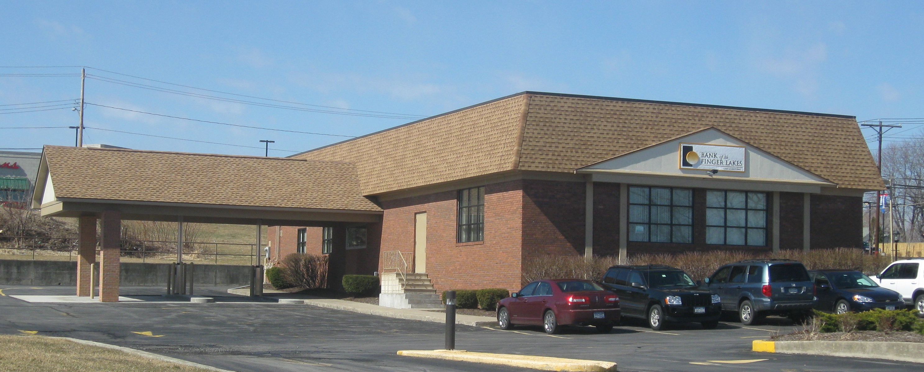 former Perkins restaurant, now a local bank with a drive up canopy.